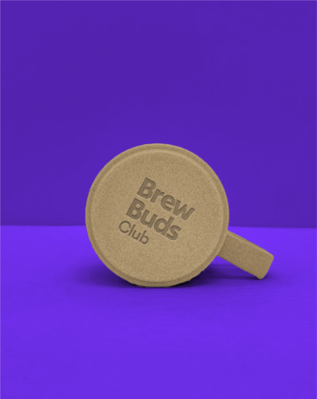 BrewBuds Club coffee mug featuring monoline illustration and logo.